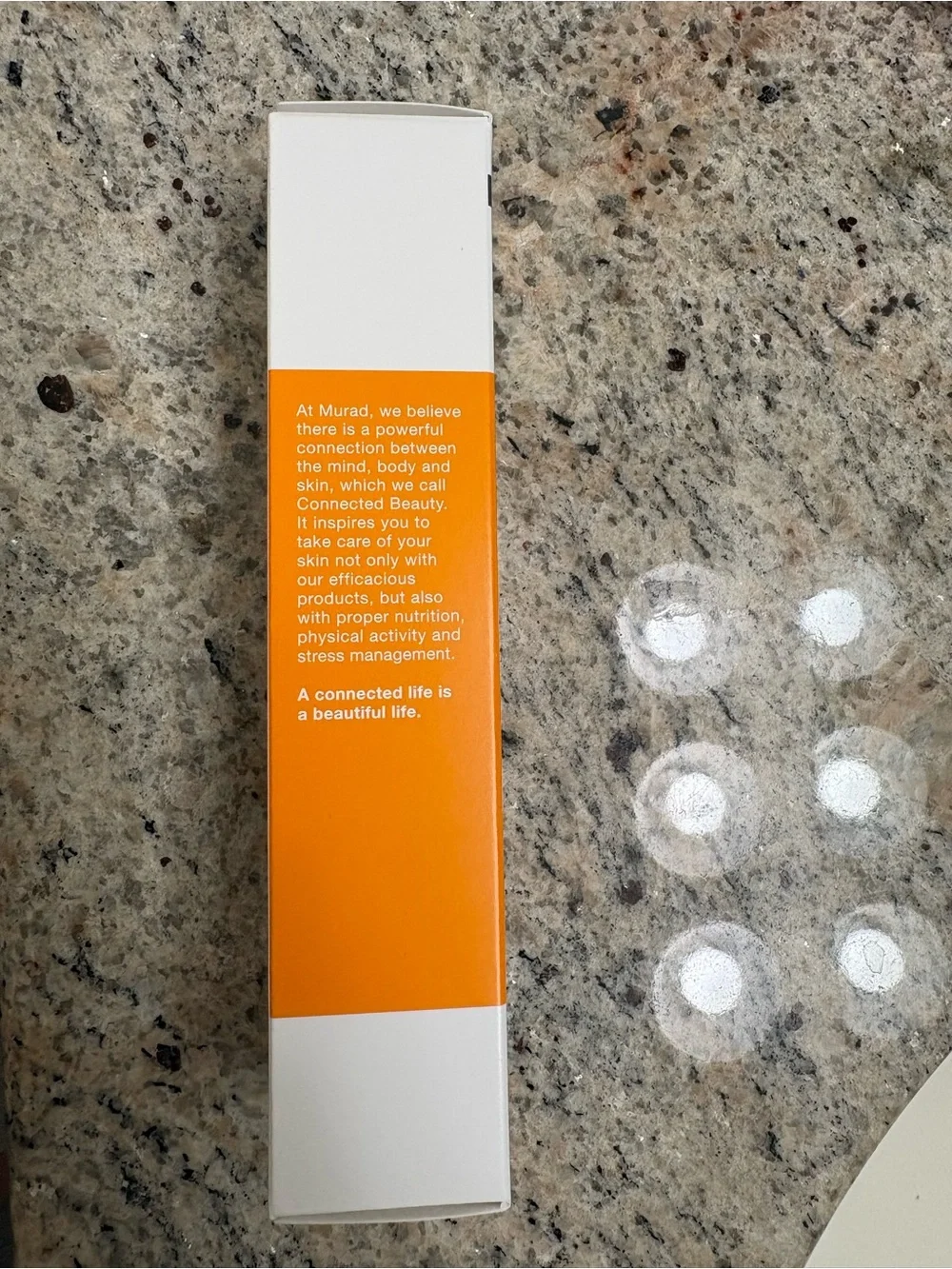 Murad Essential-C Day Moisture SPF 30 in Bright Orange Packaging